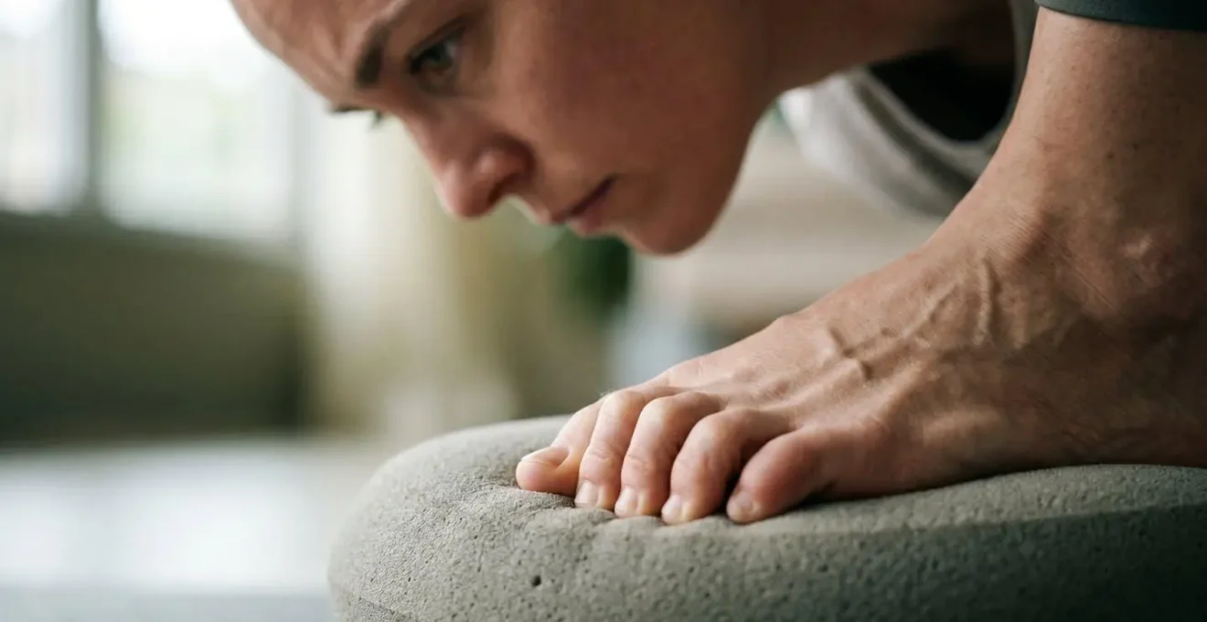 A close-up photograph illustrating focused attention during a balance exercise, symbolizing neuroplasticity through mindful movement